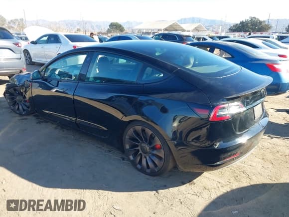 ✅ 2021 Tesla Model 3 Performance • VIN: 5YJ3E1EC6MF999321 • Lot: 41417451. Wystawiony na IAAI z przebiegiem 20 562 mil. Bezpłatny archiwum sprzedaży aukcyjnych z USA i szczegółowy raport historii pojazdu na DreamBid. Zdjęcie 3.