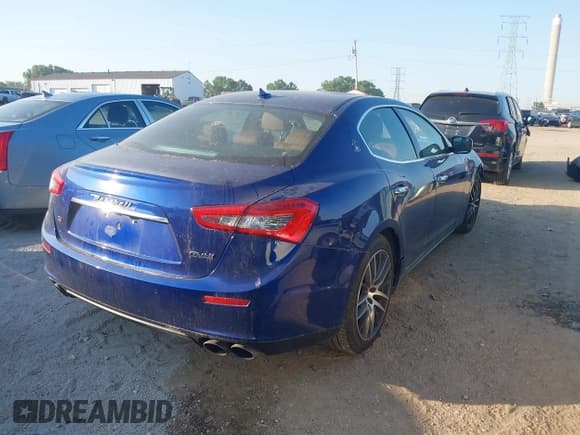 ✅ 2016 Maserati Ghibli S Q4 • VIN: ZAM57RTA3G1170492 • Lot: 42646675. Listed on IAAI with 32,934 mi. Free auction sales archive from the USA and detailed vehicle history report at DreamBid. Image 4.