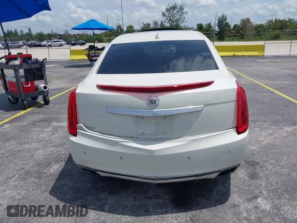 ✅ 2014 Cadillac XTS Luxury • VIN: 2G61M5S33E9326484 • Lot: 43119276. Listed on IAAI with 99,833 mi. Free auction sales archive from the USA and detailed vehicle history report at DreamBid. Image 16.