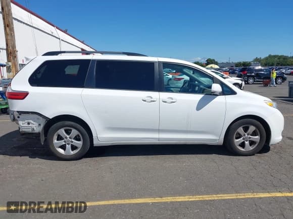 ✅ 2015 Toyota Sienna LE AAS • VIN: 5TDKK3DCXFS604928 • Lot: 43021116. Listed on IAAI with 136,454 mi. Free auction sales archive from the USA and detailed vehicle history report at DreamBid. Image 14.