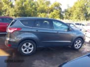 ✅ 2016 Ford Escape SE • VIN: 1FMCU9GX4GUC20913 • Lot: 43420226. Listed on IAAI with 112,669 mi. Free auction sales archive from the USA and detailed vehicle history report at DreamBid. Image 13.