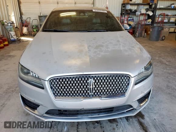 ✅ 2017 Lincoln MKZ Reserve • VIN: 3LN6L5E96HR605296 • Lot: 91032705. Wystawiony na Copart z przebiegiem 143 023 mil. Bezpłatny archiwum sprzedaży aukcyjnych z USA i szczegółowy raport historii pojazdu na DreamBid. Zdjęcie 5.