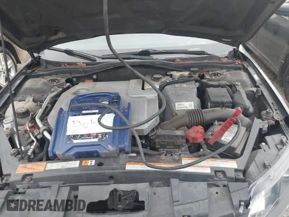 ✅ 2011 Ford Fusion Hybrid • VIN: 3FADP0L37BR171324 • Lot: 41775564. Listed on IAAI with 169,496 mi. Free auction sales archive from the USA and detailed vehicle history report at DreamBid. Image 10.