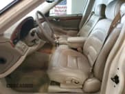 ✅ 2001 Cadillac DeVille • VIN: 1G6KD57Y31U177306 • Lot: 67041735. Wystawiony na Copart z przebiegiem 116 561 mil. Bezpłatny archiwum sprzedaży aukcyjnych z USA i szczegółowy raport historii pojazdu na DreamBid. Zdjęcie 7.