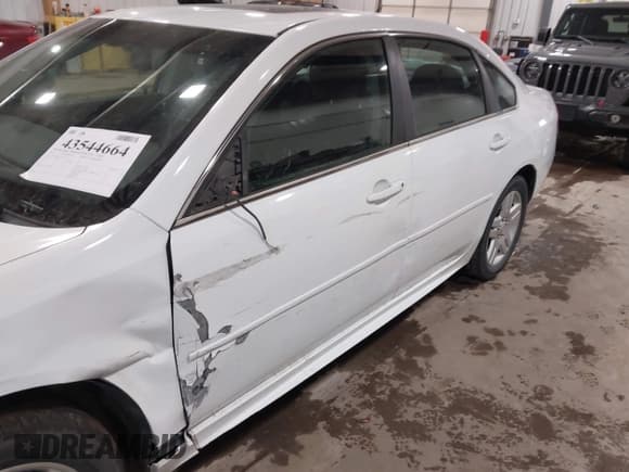 ✅ 2014 Chevrolet Impala LT • VIN: 2G1WB5E37E1139177 • Lot: 43544664. Listed on IAAI with 191,219 mi. Free auction sales archive from the USA and detailed vehicle history report at DreamBid. Image 6.