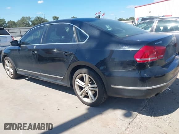 ✅ 2014 Volkswagen Passat SEL Premium • VIN: 1VWCS7A38EC055937 • Lot: 42818586. Listed on IAAI with 106,999 mi. Free auction sales archive from the USA and detailed vehicle history report at DreamBid. Image 3.