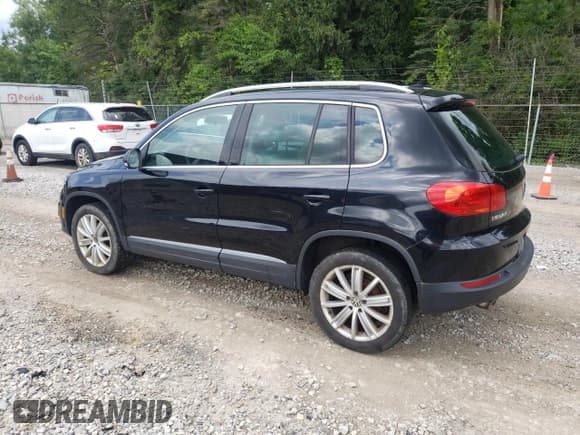 ✅ 2013 Volkswagen Tiguan SE • VIN: WVGBV7AX1DW519930 • Lot: 68591485. Listed on Copart with 196,940 mi. Free auction sales archive from the USA and detailed vehicle history report at DreamBid. Image 2.