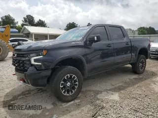 ✅ 2022 Chevrolet Silverado 1500 ZR2 • VIN: 3GCUDHEL1NG591935 • Лот: 57356935. Опубликован ранее на Copart с пробегом 26 599 миль. Бесплатный доступ к архиву аукционных продаж из США и подробный отчёт об истории автомобиля на DreamBid. Изображение 1.