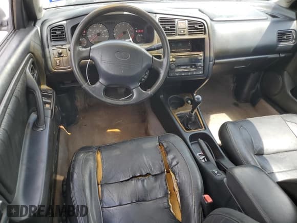 ✅ 1999 Infiniti G20 • VIN: JNKCP11A8XT015021 • Лот: 67966844. Опубликован ранее на Copart с пробегом 268 922 миль. Бесплатный доступ к архиву аукционных продаж из США и подробный отчёт об истории автомобиля на DreamBid. Изображение 8.