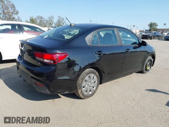 ✅ 2020 Kia Rio S • VIN: 3KPA24AD5LE297981 • Lot: 43121487. Listed on IAAI with 108,778 mi. Free auction sales archive from the USA and detailed vehicle history report at DreamBid. Image 4.