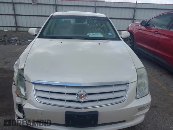 ✅ 2005 Cadillac STS • VIN: 1G6DW677150232297 • Lot: 42471215. Listed on IAAI with 87,715 mi. Free auction sales archive from the USA and detailed vehicle history report at DreamBid. Image 12.