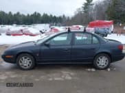 ✅ 2002 Saturn SL • VIN: 1G8ZK527X2Z197969 • Lot: 43824685. Listed on IAAI with 150,270 mi. Free auction sales archive from the USA and detailed vehicle history report at DreamBid. Image 12.