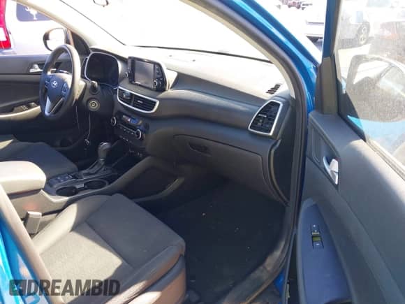 2019 Hyundai Tucson SE z VIN KM8J23A46KU004000, wystawiony jako IAAI lot #43616159 z przebiegiem 130 687 mil mil oraz . Historia ofert i sprzedaży dostępna na DreamBid. Obrazek 5.