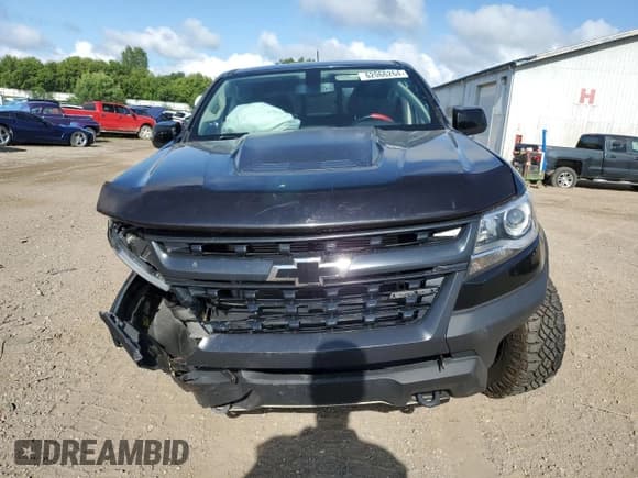 ✅ 2020 Chevrolet Colorado 4WD ZR2 • VIN: 1GCGTEEN5L1196121 • Лот: 62066264. Опубликован ранее на Copart с пробегом 54 684 миль. Бесплатный доступ к архиву аукционных продаж из США и подробный отчёт об истории автомобиля на DreamBid. Изображение 5.