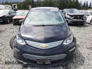 ✅ 2018 Chevrolet Bolt EV LT • VIN: 1G1FW6S04J4135302 • Lot: 56284335. Wystawiony na Copart z przebiegiem 150 478 mil. Bezpłatny archiwum sprzedaży aukcyjnych z USA i szczegółowy raport historii pojazdu na DreamBid. Zdjęcie 5.