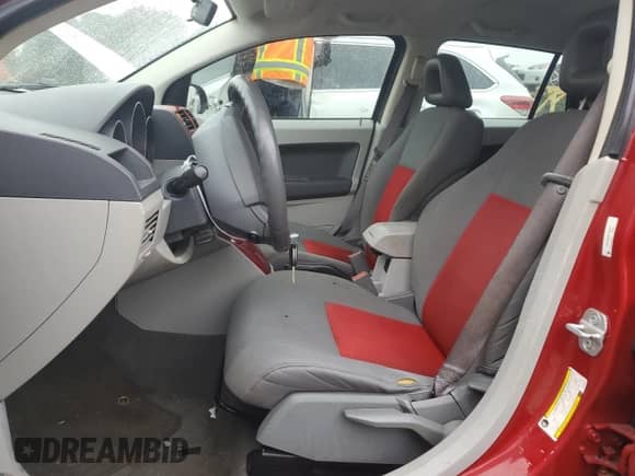 2007 Dodge Caliber SXT with VIN 1B3HB48B97D104047, listed as a Copart auction lot 73038774 with 95,782 mi miles and Salvage title. Bid and sale history available at DreamBid. Image 7.