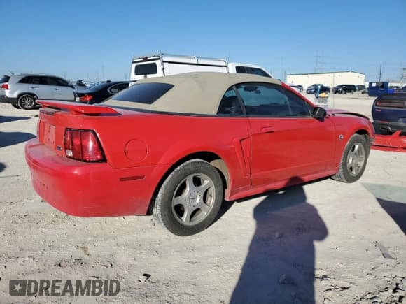 ✅ 2004 Ford Mustang Deluxe • VIN: 1FAFP444X4F126207 • Лот: 85910694. Опубликован ранее на Copart с пробегом 130 524 миль. Бесплатный доступ к архиву аукционных продаж из США и подробный отчёт об истории автомобиля на DreamBid. Изображение 3.