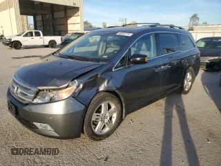 ✅ 2012 Honda Odyssey Touring • VIN: 5FNRL5H94CB060240 • Lot: 90832775. Listed on Copart with 166,777 mi. Free auction sales archive from the USA and detailed vehicle history report at DreamBid. Image 1.