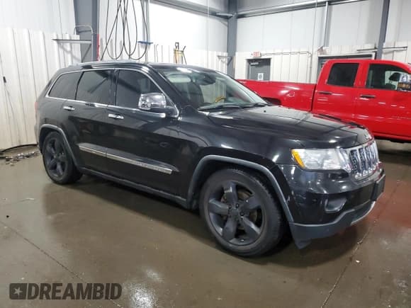 ✅ 2012 Jeep Grand Cherokee Overland • VIN: 1C4RJFCG0CC200346 • Lot: 85882075. Listed on Copart with 161,948 mi. Free auction sales archive from the USA and detailed vehicle history report at DreamBid. Image 4.