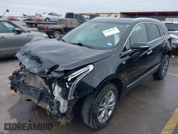 ✅ 2021 Cadillac XT5 FWD Premium Luxury • VIN: 1GYKNCRS3MZ103893 • Lot: 41286761. Listed on IAAI with 75,728 mi. Free auction sales archive from the USA and detailed vehicle history report at DreamBid. Image 2.