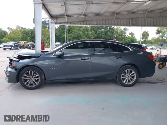 2018 Chevrolet Malibu LT z VIN 1G1ZD5ST3JF175821, wystawiony jako IAAI lot #43226436 z przebiegiem 167 996 mil mil oraz . Historia ofert i sprzedaży dostępna na DreamBid. Obrazek 14.