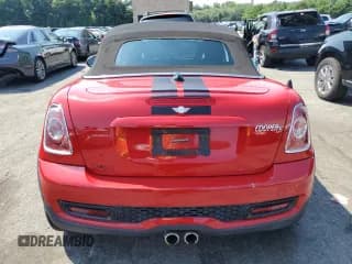 ✅ 2013 MINI Roadster S • VIN: WMWSY3C58DT594039 • Lot: 65833804. Wystawiony na Copart z przebiegiem Nie podano. Bezpłatny archiwum sprzedaży aukcyjnych z USA i szczegółowy raport historii pojazdu na DreamBid. Zdjęcie 6.