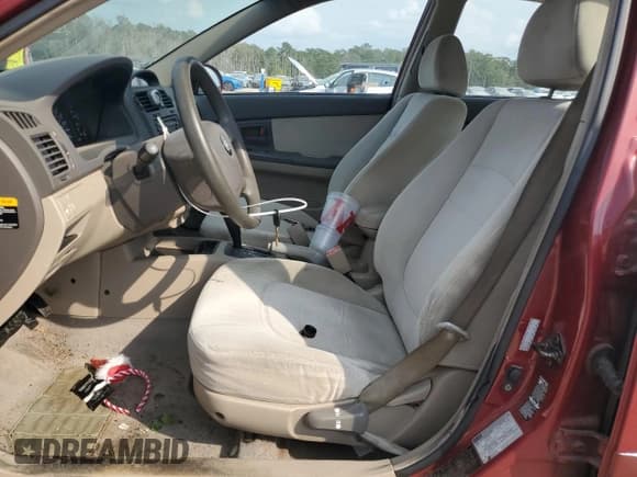 ✅ 2004 Kia Spectra LX • VIN: KNAFE121345020448 • Лот: 80732035. Опубликован ранее на Copart с пробегом 123 586 миль. Бесплатный доступ к архиву аукционных продаж из США и подробный отчёт об истории автомобиля на DreamBid. Изображение 7.