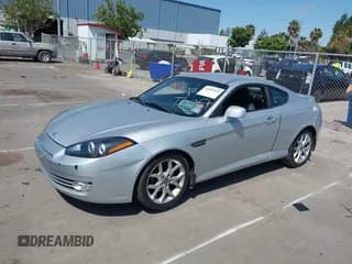 ✅ 2007 Hyundai Tiburon GT • VIN: KMHHN66F97U253187 • Лот: 40457431. Опубликован ранее на IAAI с пробегом 118 312 миль. Бесплатный доступ к архиву аукционных продаж из США и подробный отчёт об истории автомобиля на DreamBid. Изображение 2.