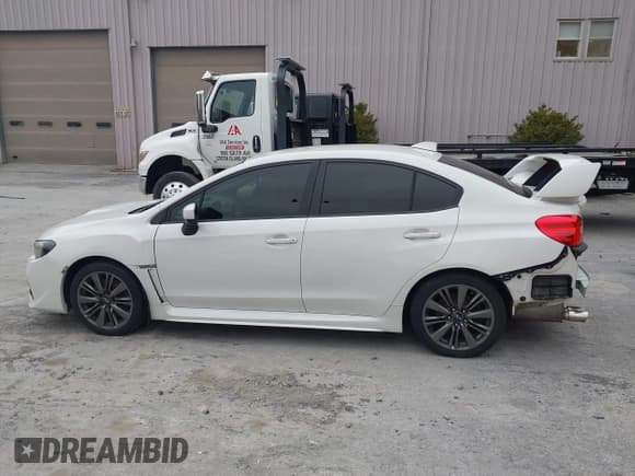✅ 2015 Subaru WRX • VIN: JF1VA1A67F9819707 • Lot: 42021831. Listed on IAAI with 104,706 mi. Free auction sales archive from the USA and detailed vehicle history report at DreamBid. Image 14.