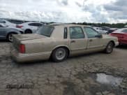 ✅ 1997 Lincoln Town Car Executive • VIN: 1LNLM81WXVY742669 • Lot: 64091544. Listed on Copart with Not provided. Free auction sales archive from the USA and detailed vehicle history report at DreamBid. Image 3.