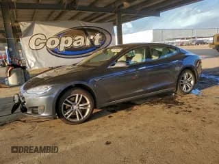 ✅ 2015 Tesla Model S 85 • VIN: 5YJSA1H1XFF091538 • Lot: 95718125. Listed on Copart with 136,482 mi. Free auction sales archive from the USA and detailed vehicle history report at DreamBid. Image 1.