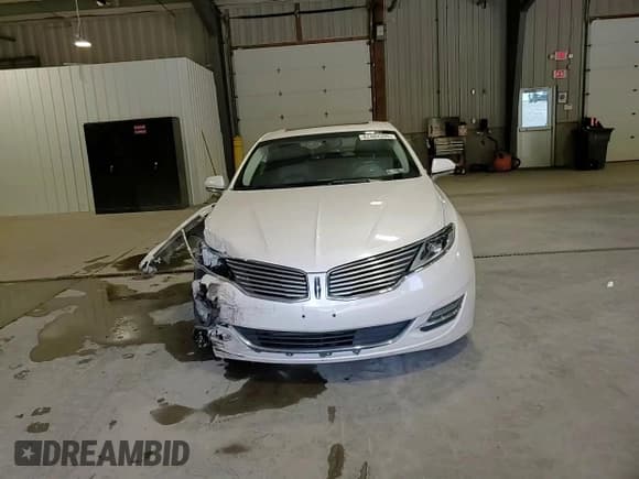 ✅ 2015 Lincoln MKZ • VIN: 3LN6L2J92FR607094 • Lot: 82484395. Wystawiony na Copart z przebiegiem 120 430 mil. Bezpłatny archiwum sprzedaży aukcyjnych z USA i szczegółowy raport historii pojazdu na DreamBid. Zdjęcie 14.