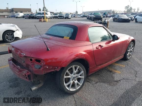 ✅ 2015 Mazda MX-5 Miata Grand Touring • VIN: JM1NC2PF9F0241793 • Lot: 43373257. Listed on IAAI with 127,984 mi. Free auction sales archive from the USA and detailed vehicle history report at DreamBid. Image 4.