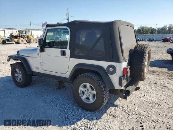 ✅ 2006 Jeep Wrangler X • VIN: 1J4FA39S56P770203 • Lot: 87086945. Listed on Copart with 128,489 mi. Free auction sales archive from the USA and detailed vehicle history report at DreamBid. Image 2.
