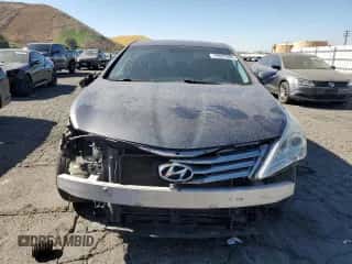 2013 Hyundai Azera z VIN KMHFG4JG1DA200387, wystawiony jako Copart lot #78887004 z przebiegiem 130 876 mil mil oraz Szkoda całkowita • Salvage title. Historia ofert i sprzedaży dostępna na DreamBid. Obrazek 5.
