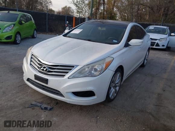 ✅ 2014 Hyundai Azera Limited • VIN: KMHFH4JG6EA362496 • Lot: 43675442. Listed on IAAI with 219,996 mi. Free auction sales archive from the USA and detailed vehicle history report at DreamBid. Image 2.