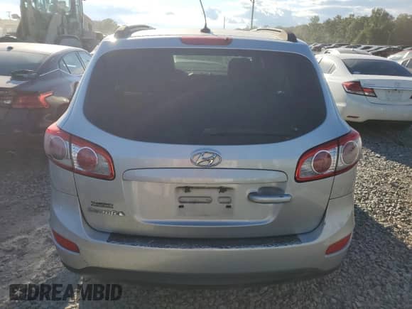 2012 Hyundai Santa Fe GLS z VIN 5XYZG3AB2CG101415, wystawiony jako Copart lot #73183934 z przebiegiem 184 622 mil mil oraz Szkoda całkowita • Salvage title. Historia ofert i sprzedaży dostępna na DreamBid. Obrazek 6.