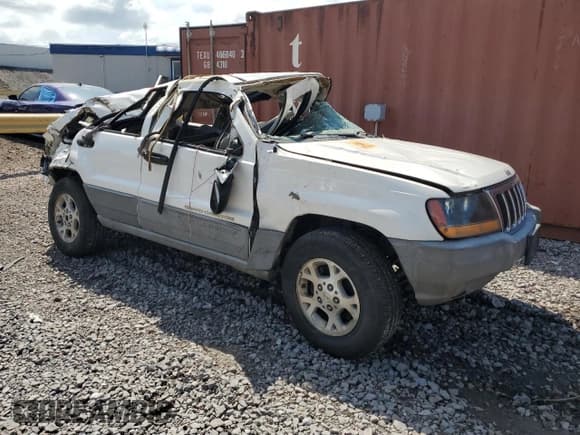 ✅ 2000 Jeep Grand Cherokee Laredo • VIN: 1J4G248S1YC329509 • Лот: 58589373. Опубликован ранее на Copart с пробегом Не указан. Бесплатный доступ к архиву аукционных продаж из США и подробный отчёт об истории автомобиля на DreamBid. Изображение 4.