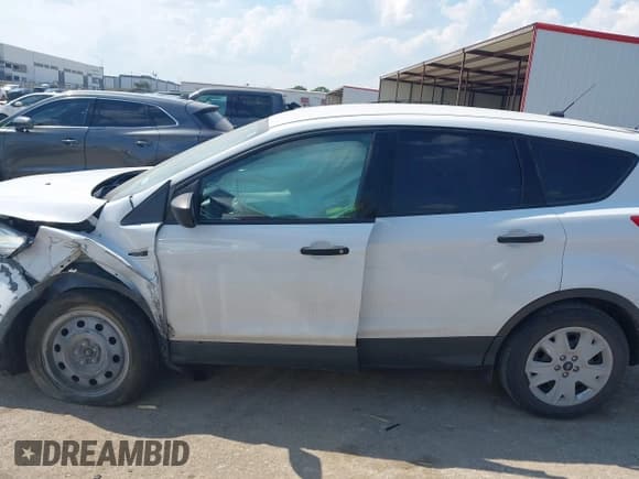 ✅ 2015 Ford Escape S • VIN: 1FMCU0F7XFUB44027 • Lot: 43251455. Listed on IAAI with 143,721 mi. Free auction sales archive from the USA and detailed vehicle history report at DreamBid. Image 13.