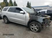 ✅ 2012 Dodge Durango SXT • VIN: 1C4RDHAGXCC173047 • Лот: 70950145. Опубликован ранее на Copart с пробегом Не указан. Бесплатный доступ к архиву аукционных продаж из США и подробный отчёт об истории автомобиля на DreamBid. Изображение 4.