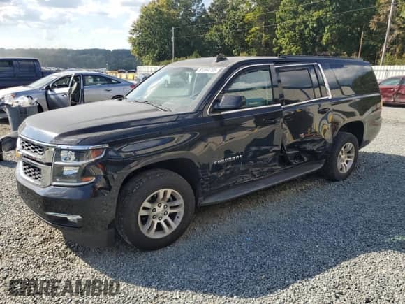 2015 Chevrolet Suburban LT with VIN 1GNSKJKC7FR698649, listed as a Copart auction lot 81584735 with 128,360 mi miles and Salvage title. Bid and sale history available at DreamBid. Image 1.