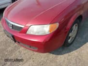 ✅ 2002 Mazda Protege DX • VIN: JM1BJ225520501057 • Lot: 42979132. Wystawiony na IAAI z przebiegiem 140 232 mil. Bezpłatny archiwum sprzedaży aukcyjnych z USA i szczegółowy raport historii pojazdu na DreamBid. Zdjęcie 6.