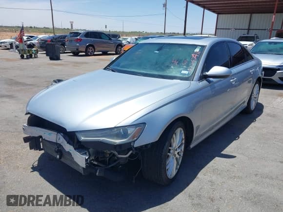 ✅ 2016 Audi A6 Premium • VIN: WAUFFAFC0GN076036 • Lot: 42242476. Wystawiony na IAAI z przebiegiem 129 313 mil. Bezpłatny archiwum sprzedaży aukcyjnych z USA i szczegółowy raport historii pojazdu na DreamBid. Zdjęcie 2.