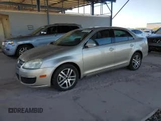 ✅ 2005 Volkswagen Jetta 2.5L • VIN: 3VWSF71K75M639543 • Lot: 52811025. Listed on Copart with 221,793 mi. Free auction sales archive from the USA and detailed vehicle history report at DreamBid. Image 1.