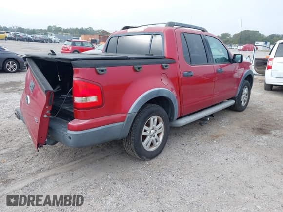 ✅ 2010 Ford Explorer Sport Trac XLT • VIN: 1FMEU5BE4AUA36831 • Лот: 43757652. Опубликован ранее на IAAI с пробегом 214 048 миль. Бесплатный доступ к архиву аукционных продаж из США и подробный отчёт об истории автомобиля на DreamBid. Изображение 4.