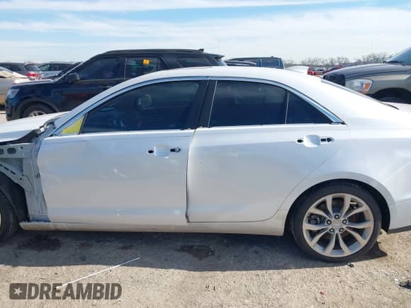 ✅ 2015 Cadillac ATS Performance RWD • VIN: 1G6AC5SX4F0113027 • Лот: 41307410. Опубликован ранее на IAAI с пробегом 125 336 миль. Бесплатный доступ к архиву аукционных продаж из США и подробный отчёт об истории автомобиля на DreamBid. Изображение 14.