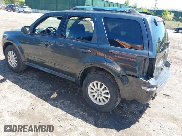 ✅ 2010 Mercury Mariner Premier • VIN: 4M2CN9HG8AKJ18091 • Lot: 42215475. Listed on IAAI with 97,332 mi. Free auction sales archive from the USA and detailed vehicle history report at DreamBid. Image 3.