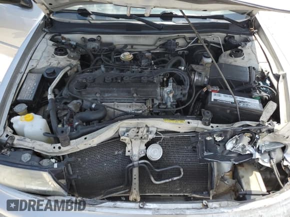 ✅ 1997 Nissan Altima XE • VIN: 1N4BU31D1VC200428 • Lot: 52252425. Listed on Copart with 173,553 mi. Free auction sales archive from the USA and detailed vehicle history report at DreamBid. Image 12.