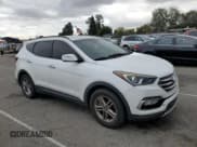 ✅ 2017 Hyundai Santa Fe 2.4L • VIN: 5NMZU3LB8HH026562 • Лот: 69805812. Опубликован ранее на Copart с пробегом 124 554 миль. Бесплатный доступ к архиву аукционных продаж из США и подробный отчёт об истории автомобиля на DreamBid. Изображение 4.