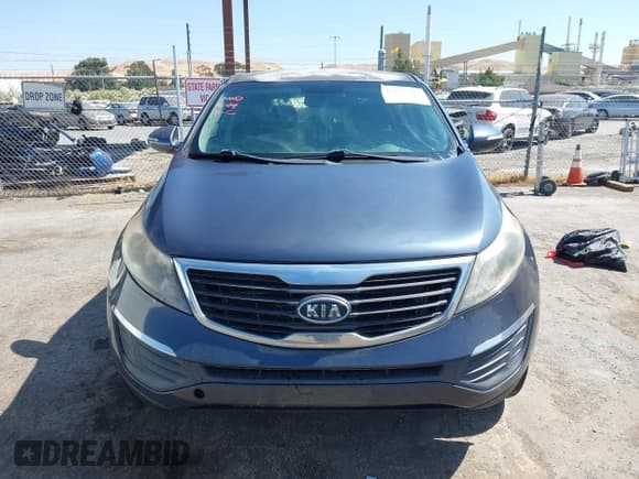 ✅ 2012 Kia Sportage LX • VIN: KNDPB3A28C7186408 • Lot: 42575535. Listed on IAAI with 232,994 mi. Free auction sales archive from the USA and detailed vehicle history report at DreamBid. Image 12.